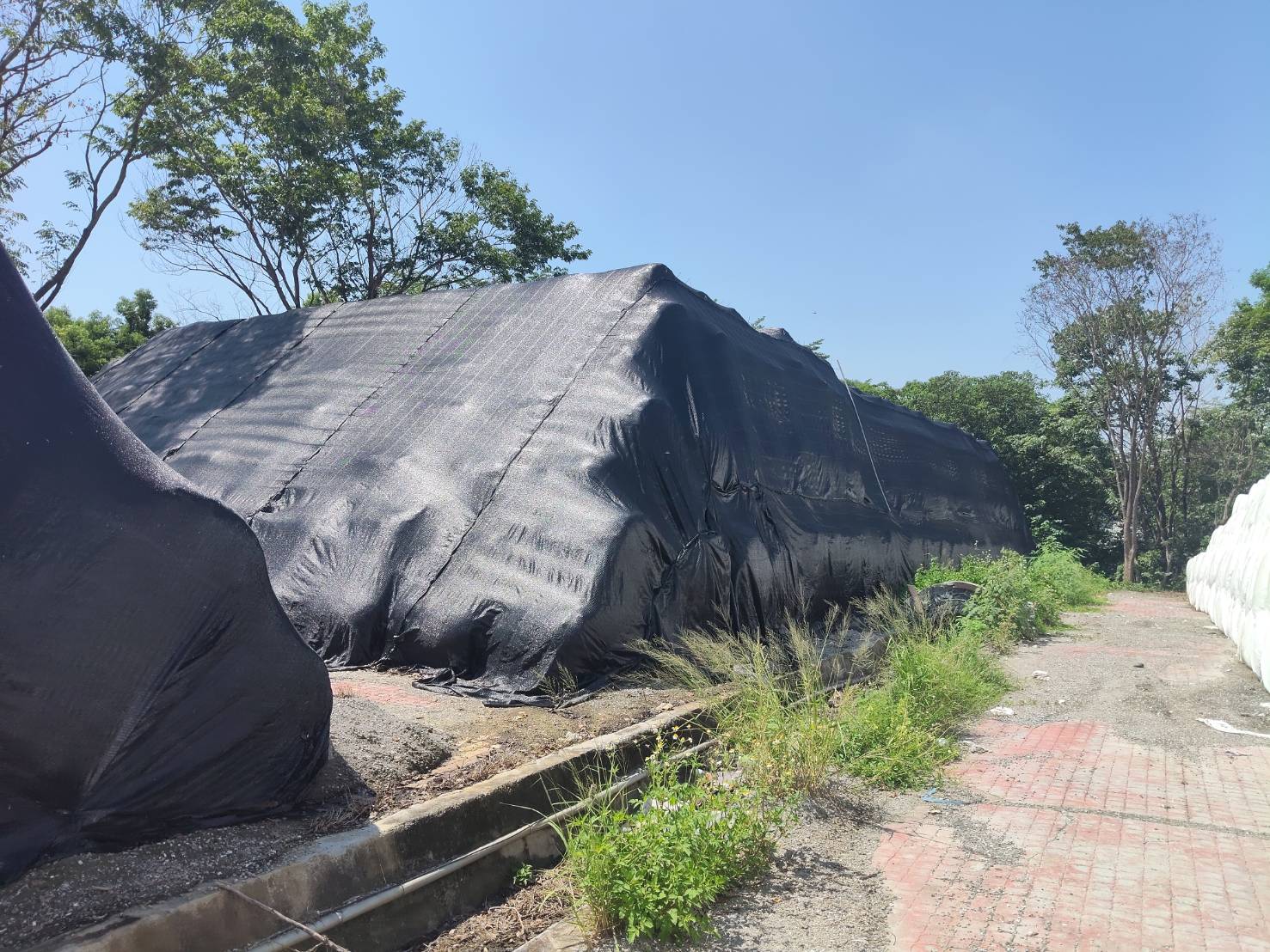 破除「垃圾山」謠言！　大里掩埋場合法營運、3萬噸地面上垃圾將優先焚化